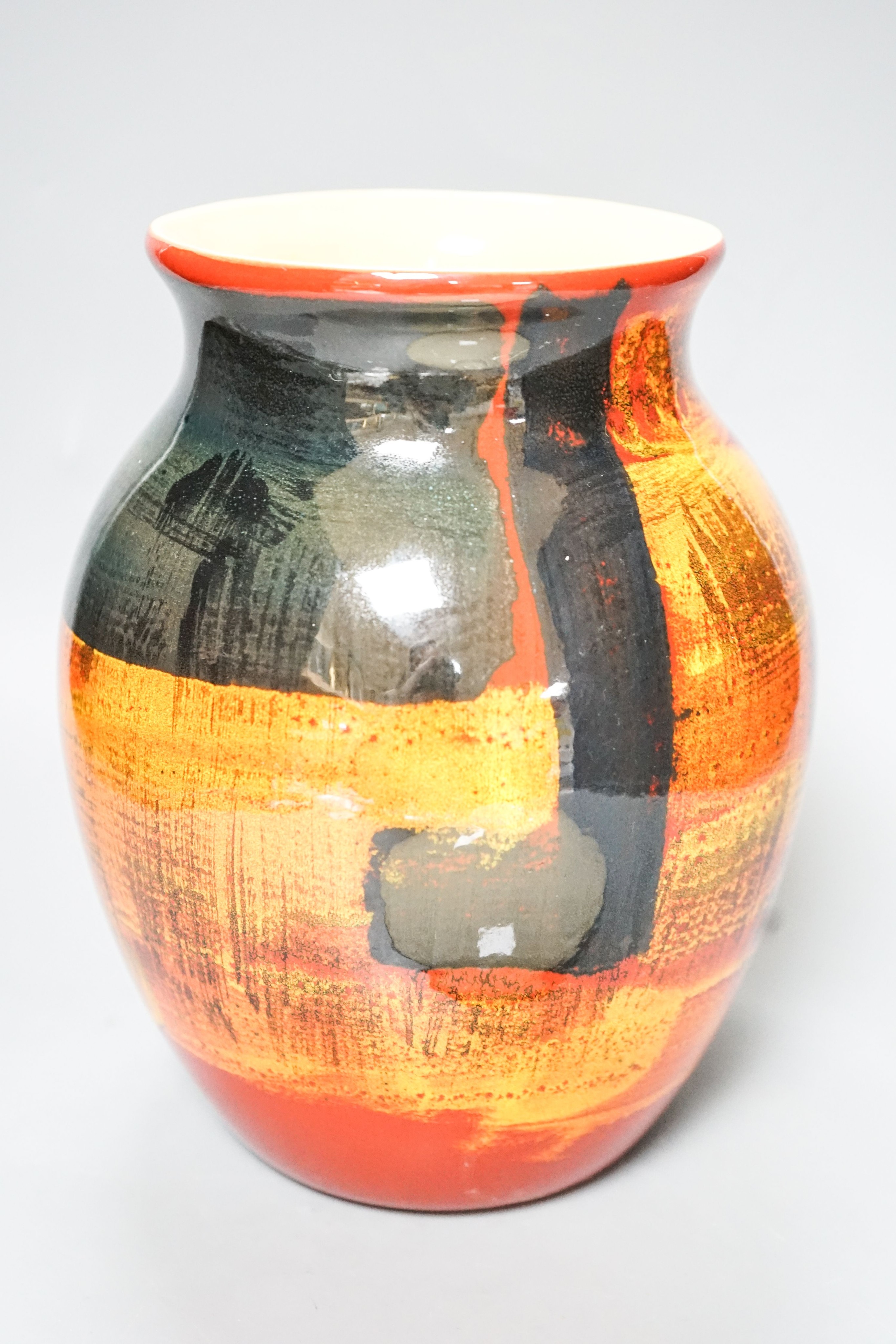 A Poole pottery vase and a shallow dish 27cm